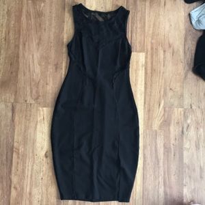 Sexy black cocktail dress with lace cut outs